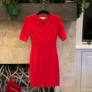 Diane von Furstenberg red dress with zippers.